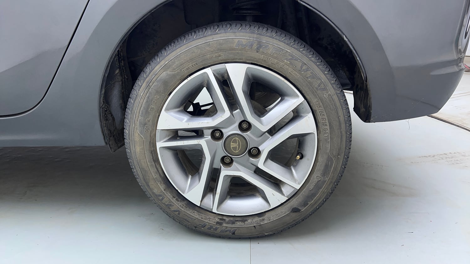 Used 2023 Tata Tigor XZA Plus Leatherette Pack Petrol Automatic tyres LEFT REAR TYRE RIM VIEW