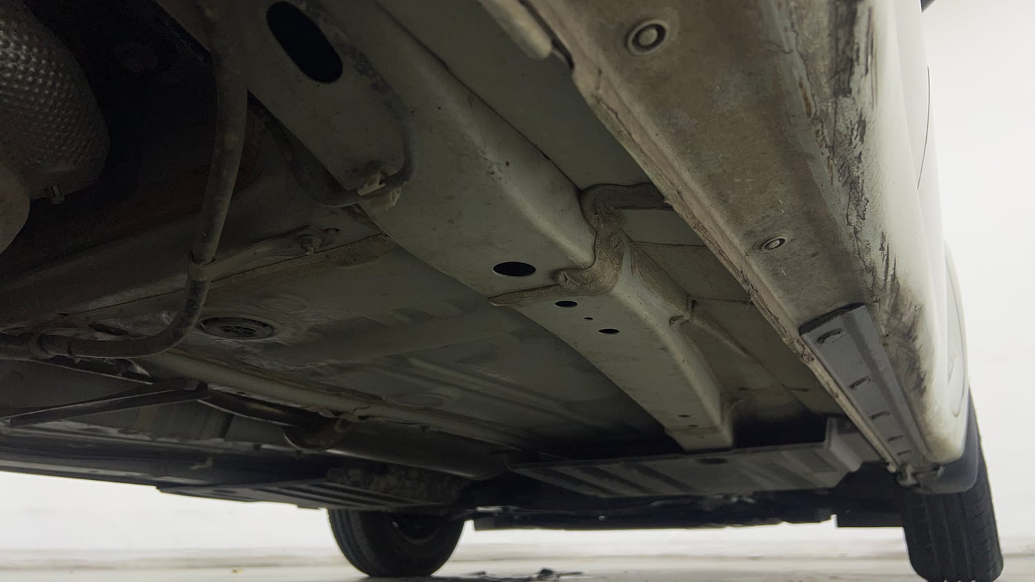 Used 2023 Maruti Suzuki Swift LXi Petrol Manual extra REAR RIGHT UNDERBODY VIEW