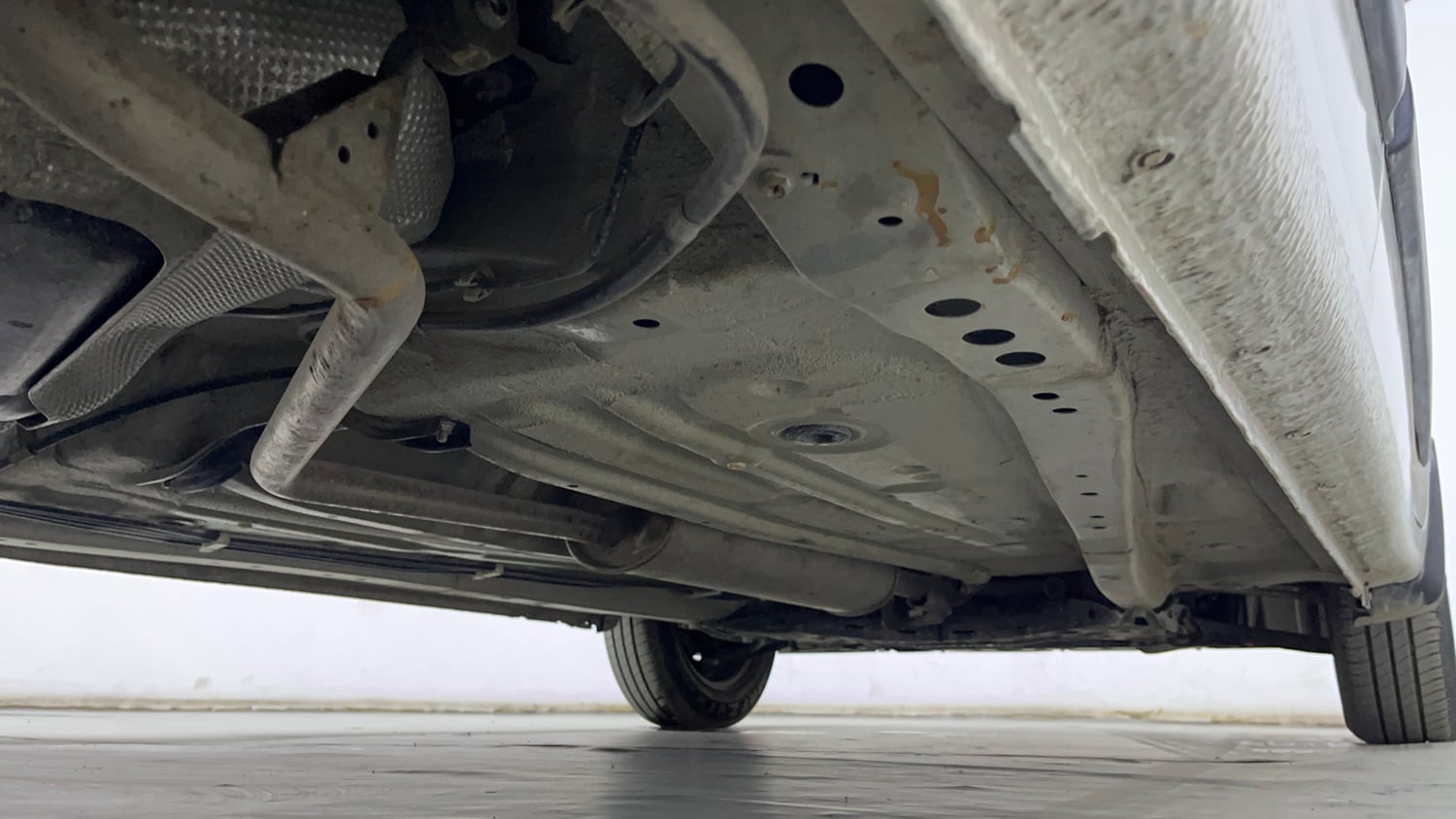 Used 2024 Maruti Suzuki Wagon R VXI 1.0 AGS Petrol Automatic extra REAR RIGHT UNDERBODY VIEW