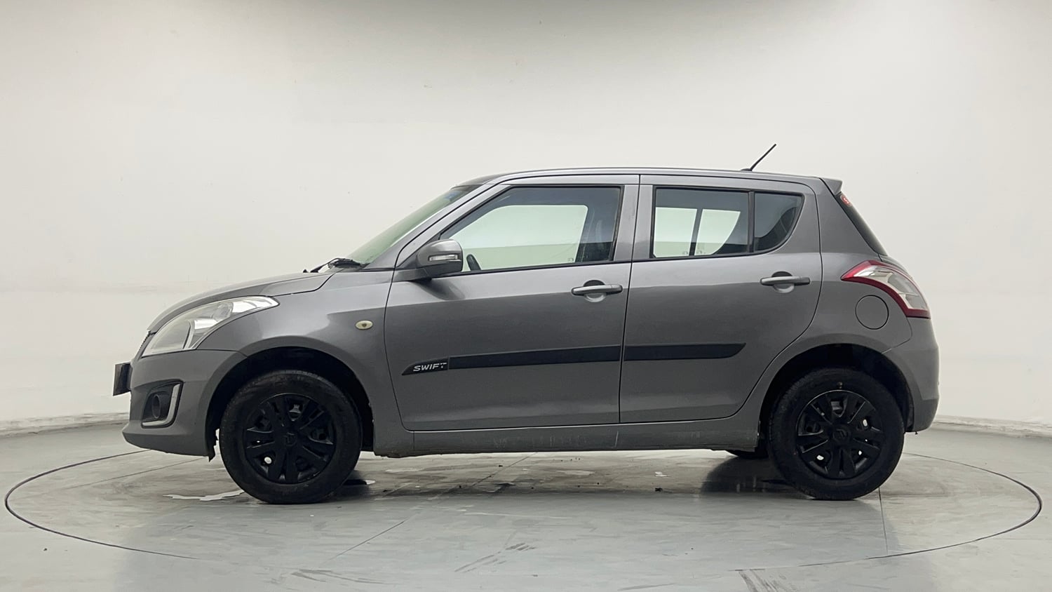 Used 2015 Maruti Suzuki Swift Lxi (O) Petrol Manual exterior LEFT SIDE VIEW