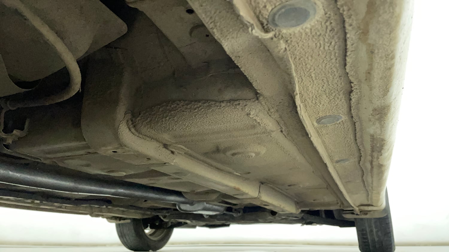 Used 2014 Hyundai Xcent S 1.2 (O) Petrol Manual extra REAR RIGHT UNDERBODY VIEW