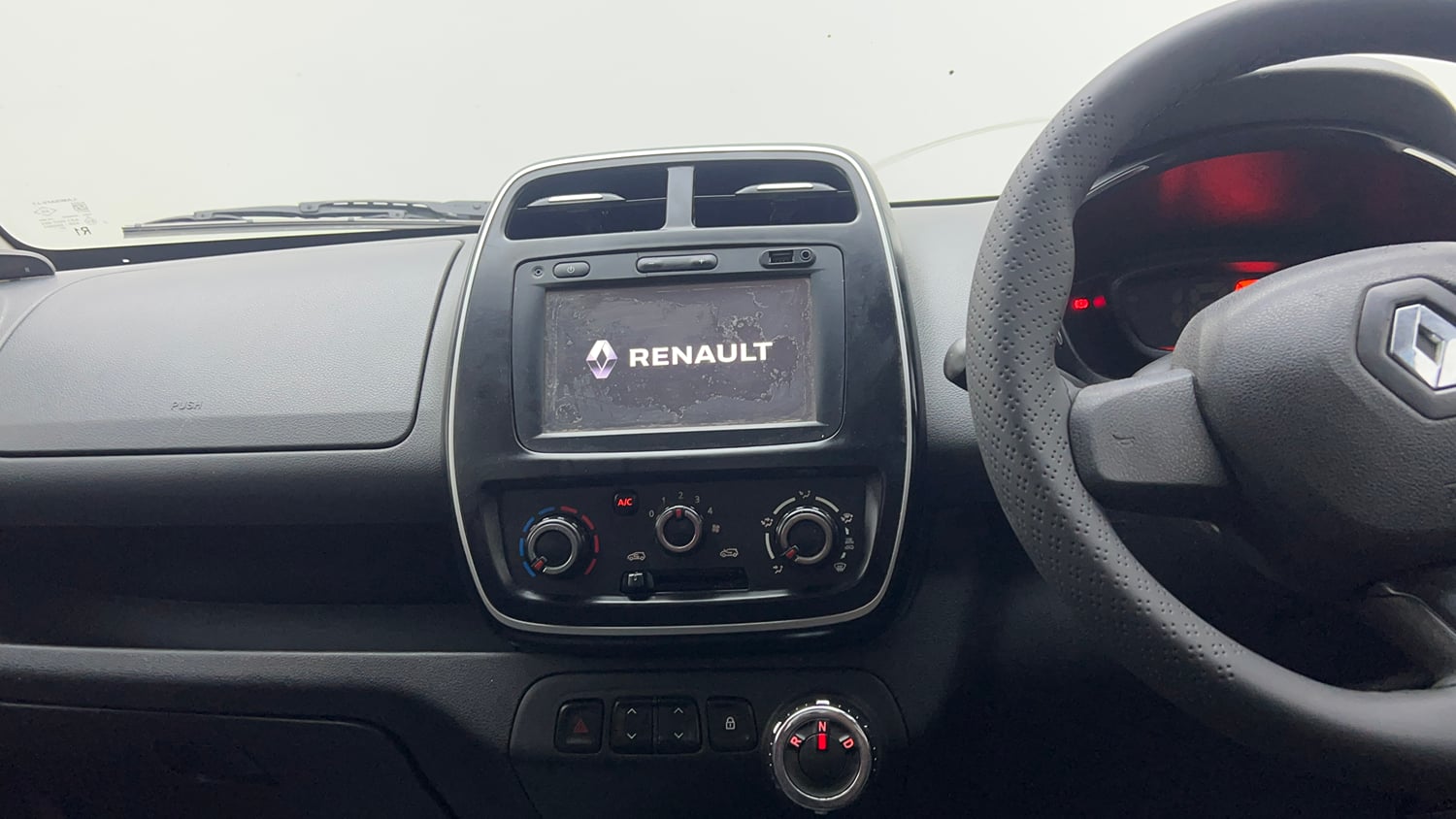 Used 2018 Renault Kwid 1.0 RXT AMT Opt Petrol Automatic top_features Integrated (in-dash) music system