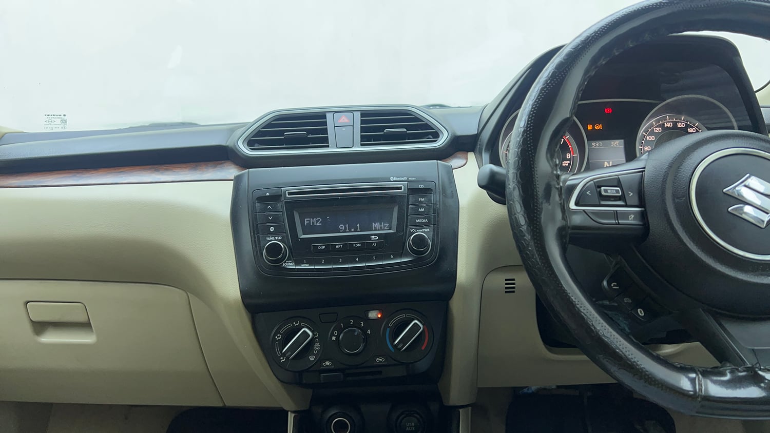 Used 2019 Maruti Suzuki Dzire VXi AMT Petrol Automatic top_features Integrated (in-dash) music system