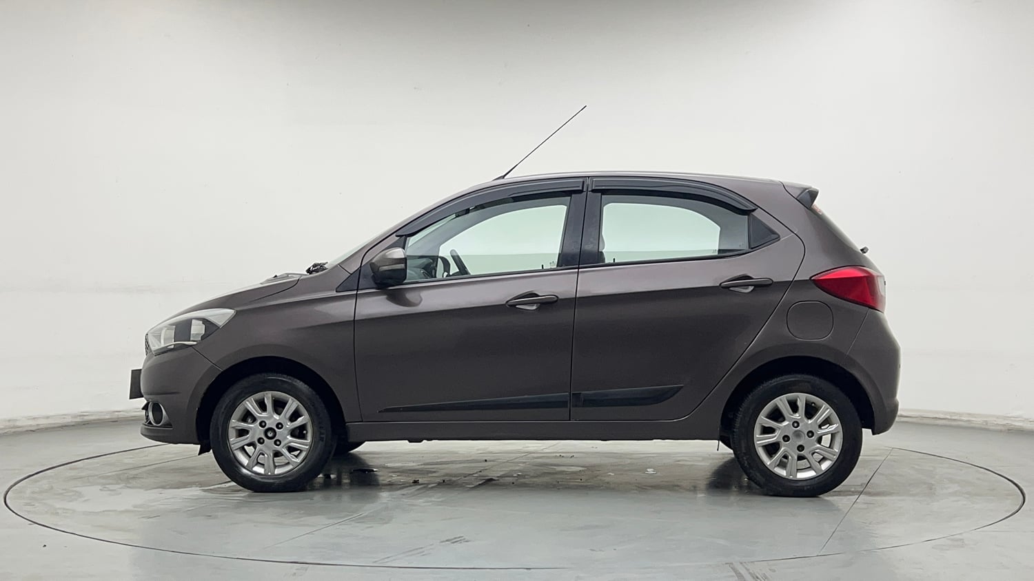 Used 2017 Tata Tiago Revotron XZ Petrol Manual exterior LEFT SIDE VIEW