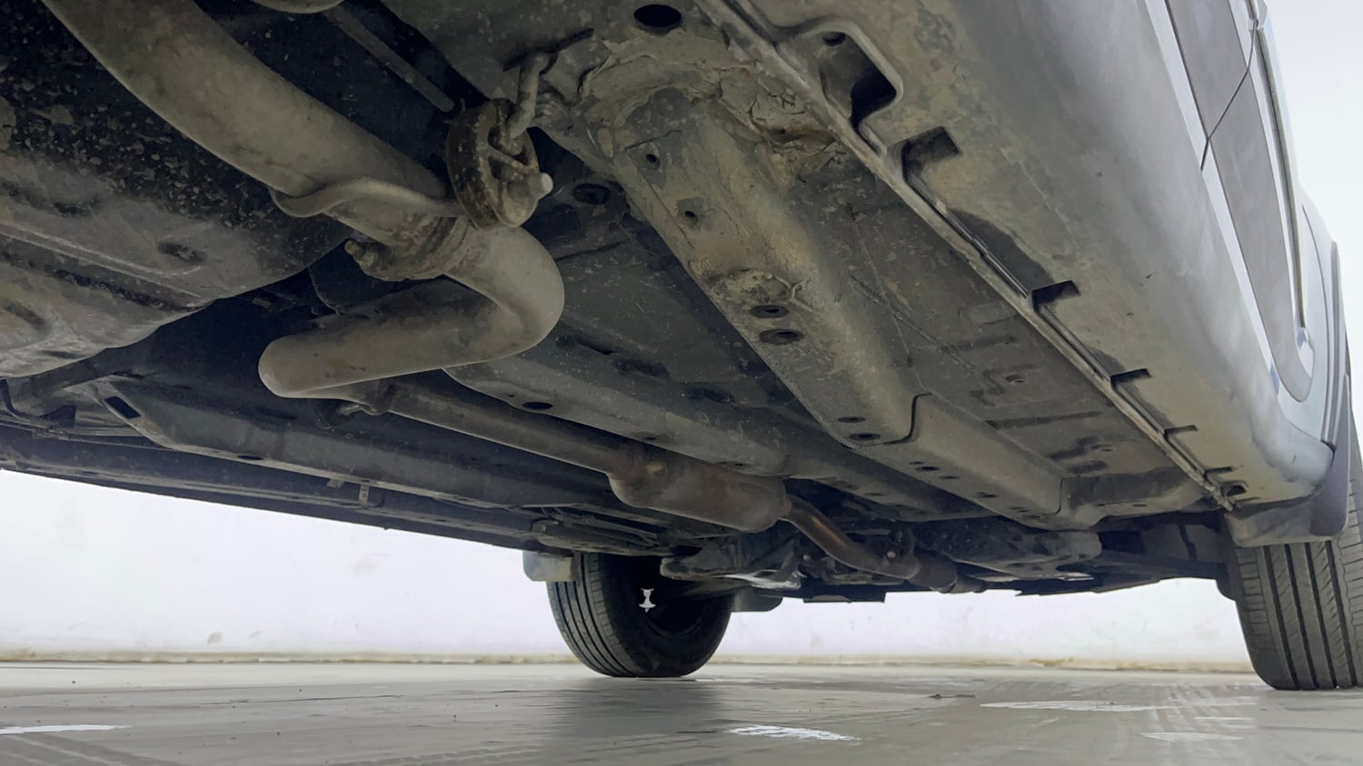 Used 2025 Tata Nexon Creative Plus 1.2 Revotron Petrol 7DCA DT Petrol Automatic extra REAR RIGHT UNDERBODY VIEW