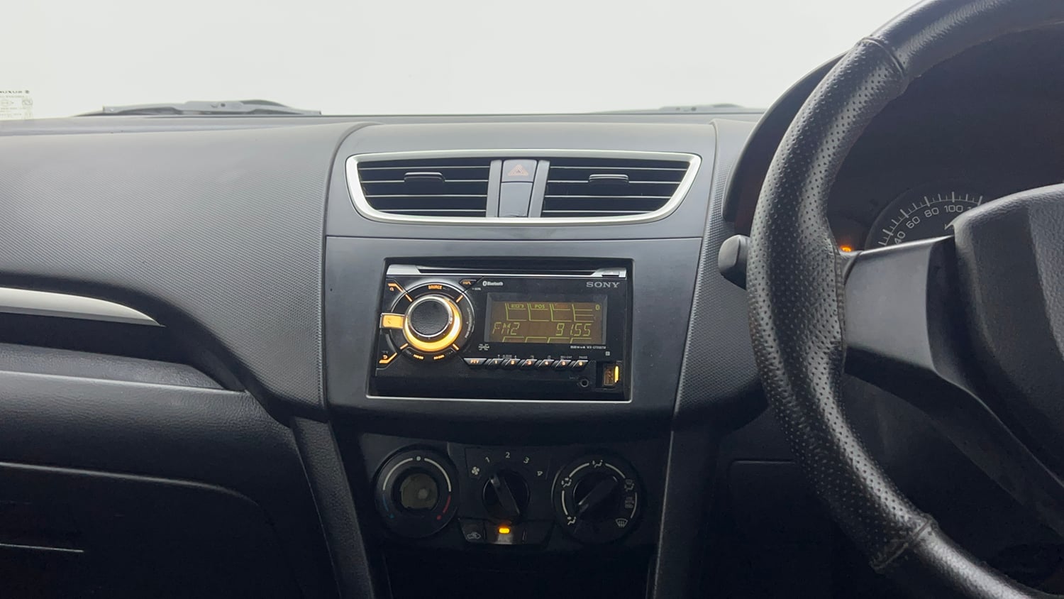 Used 2015 Maruti Suzuki Swift Lxi (O) Petrol Manual interior MUSIC SYSTEM & AC CONTROL VIEW
