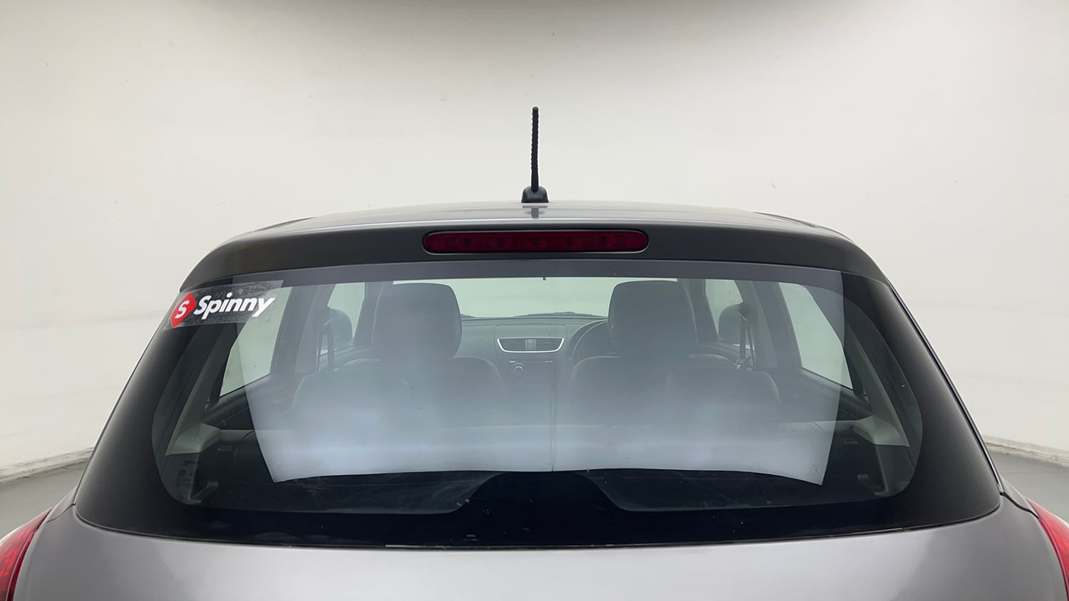 Used 2015 Maruti Suzuki Swift Lxi (O) Petrol Manual exterior BACK WINDSHIELD VIEW