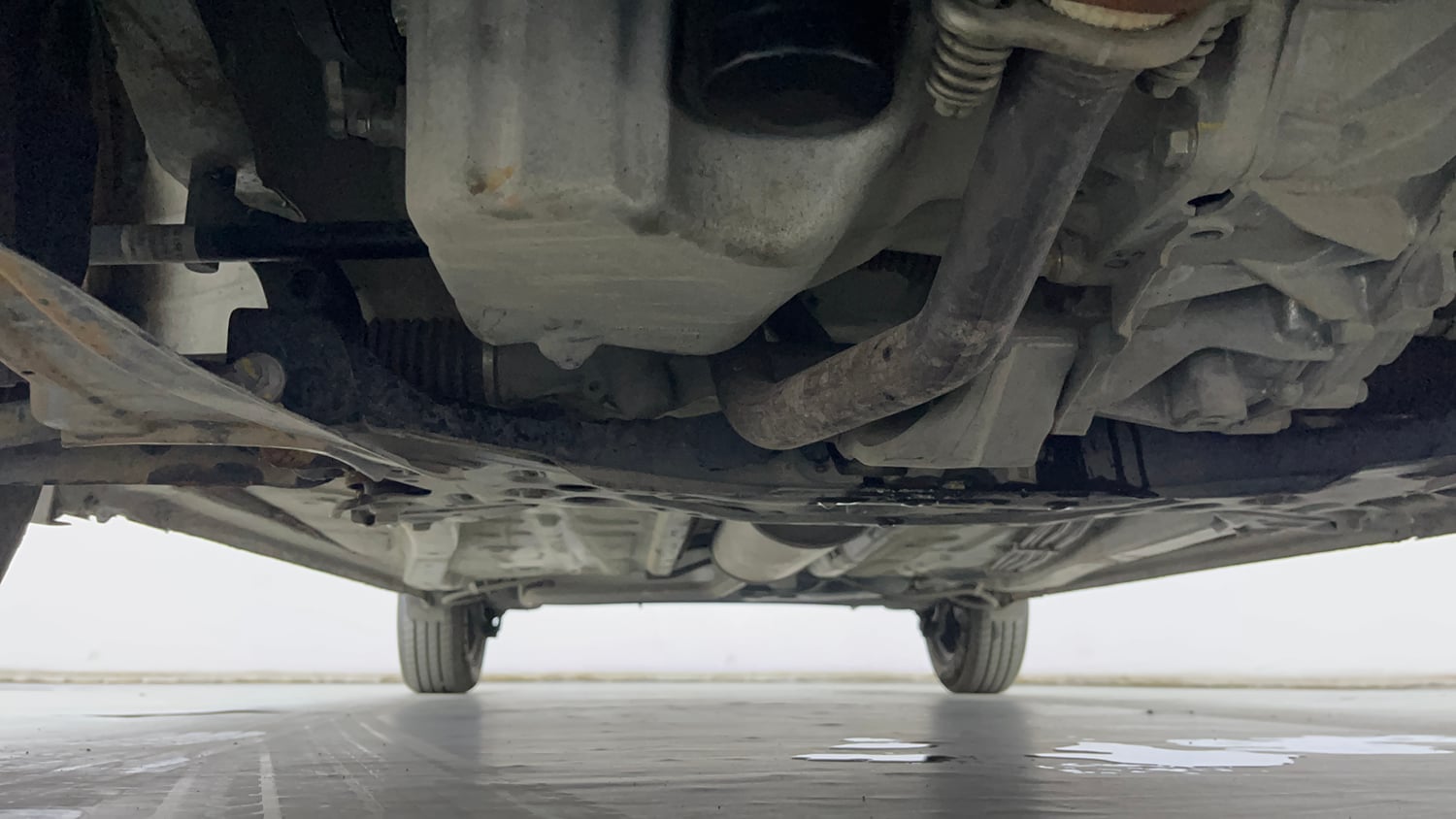Used 2024 Maruti Suzuki Wagon R VXI 1.0 AGS Petrol Automatic extra FRONT LEFT UNDERBODY VIEW