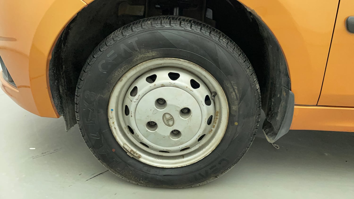 Used 2017 Tata Tiago Revotron XM Petrol Manual tyres LEFT FRONT TYRE RIM VIEW