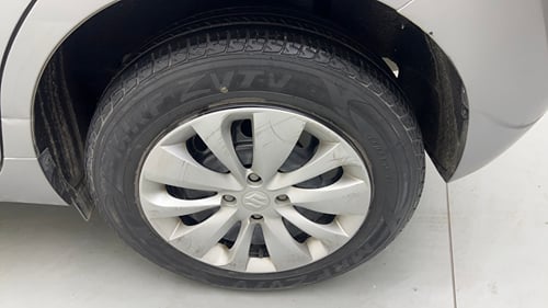 Used 2015 Maruti Suzuki Baleno Delta 1.2 Petrol Manual tyres LEFT REAR TYRE RIM VIEW