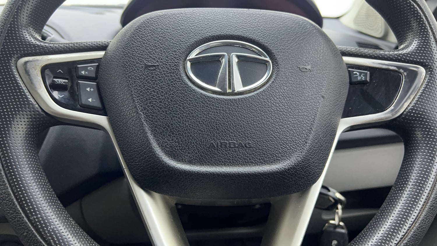 Used 2017 Tata Tiago Revotron XZ Petrol Manual top_features Steering mounted controls
