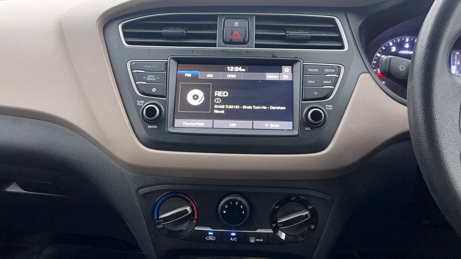 Used 2019 Hyundai Elite i20 Sportz Plus 1.2 Petrol Manual interior MUSIC SYSTEM & AC CONTROL VIEW