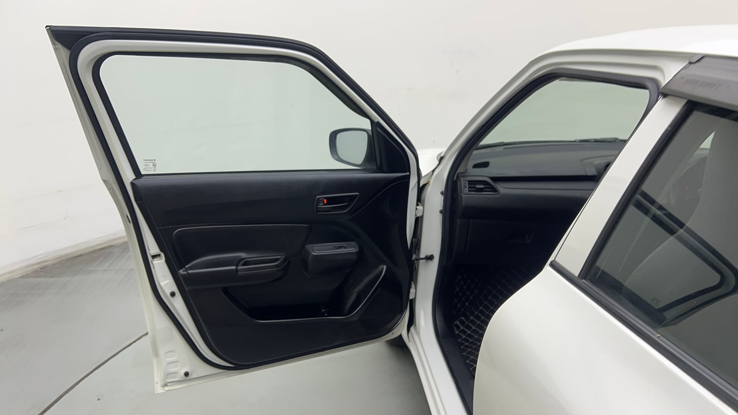 Used 2023 Maruti Suzuki Swift LXi Petrol Manual interior LEFT FRONT DOOR OPEN VIEW