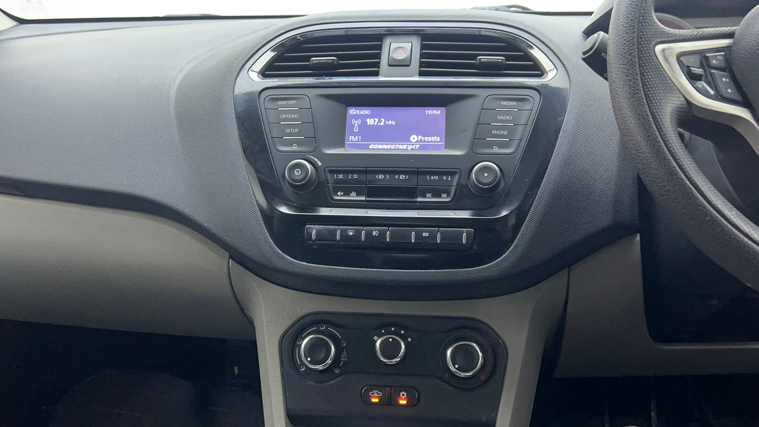 Used 2017 Tata Tiago Revotron XZ Petrol Manual interior MUSIC SYSTEM & AC CONTROL VIEW