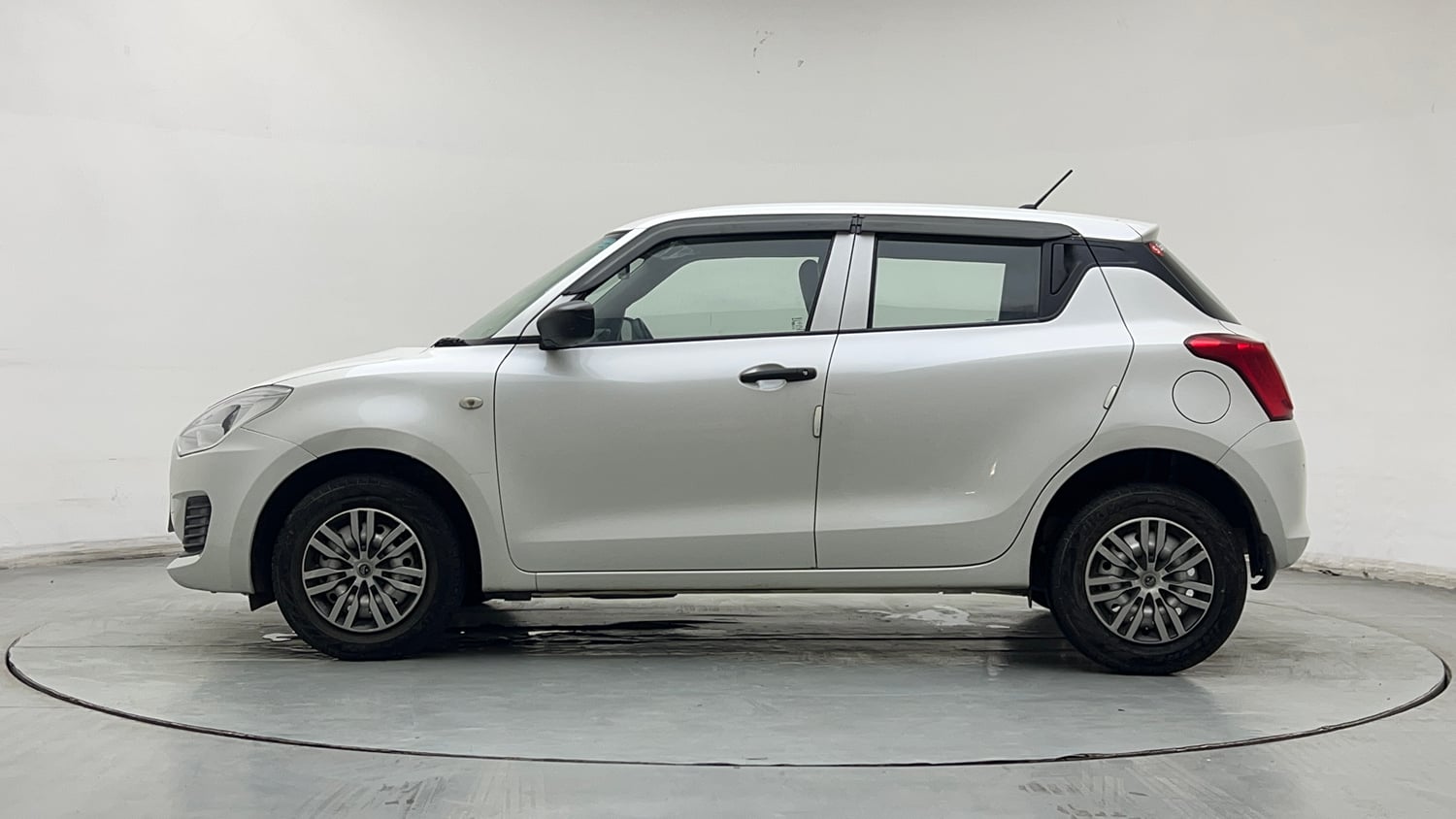 Used 2023 Maruti Suzuki Swift LXi Petrol Manual exterior LEFT SIDE VIEW