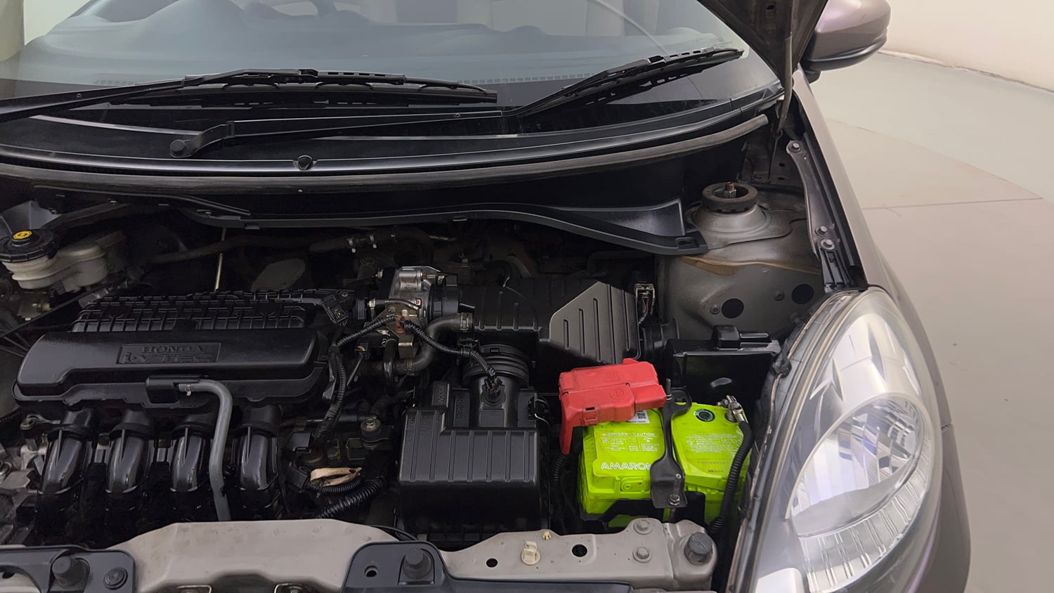 Used 2015 Honda Brio VX AT Petrol Automatic engine ENGINE LEFT SIDE HINGE & APRON VIEW