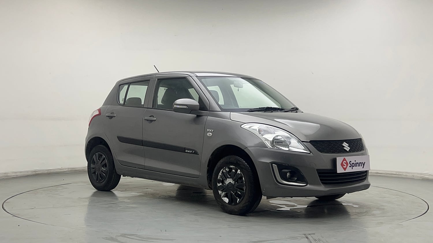 Used 2015 Maruti Suzuki Swift Lxi (O) Petrol Manual exterior RIGHT FRONT CORNER VIEW