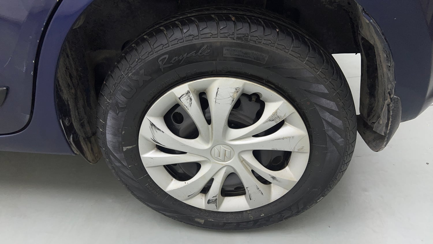 Used 2021 Maruti Suzuki Swift VXi Petrol Manual tyres LEFT REAR TYRE RIM VIEW