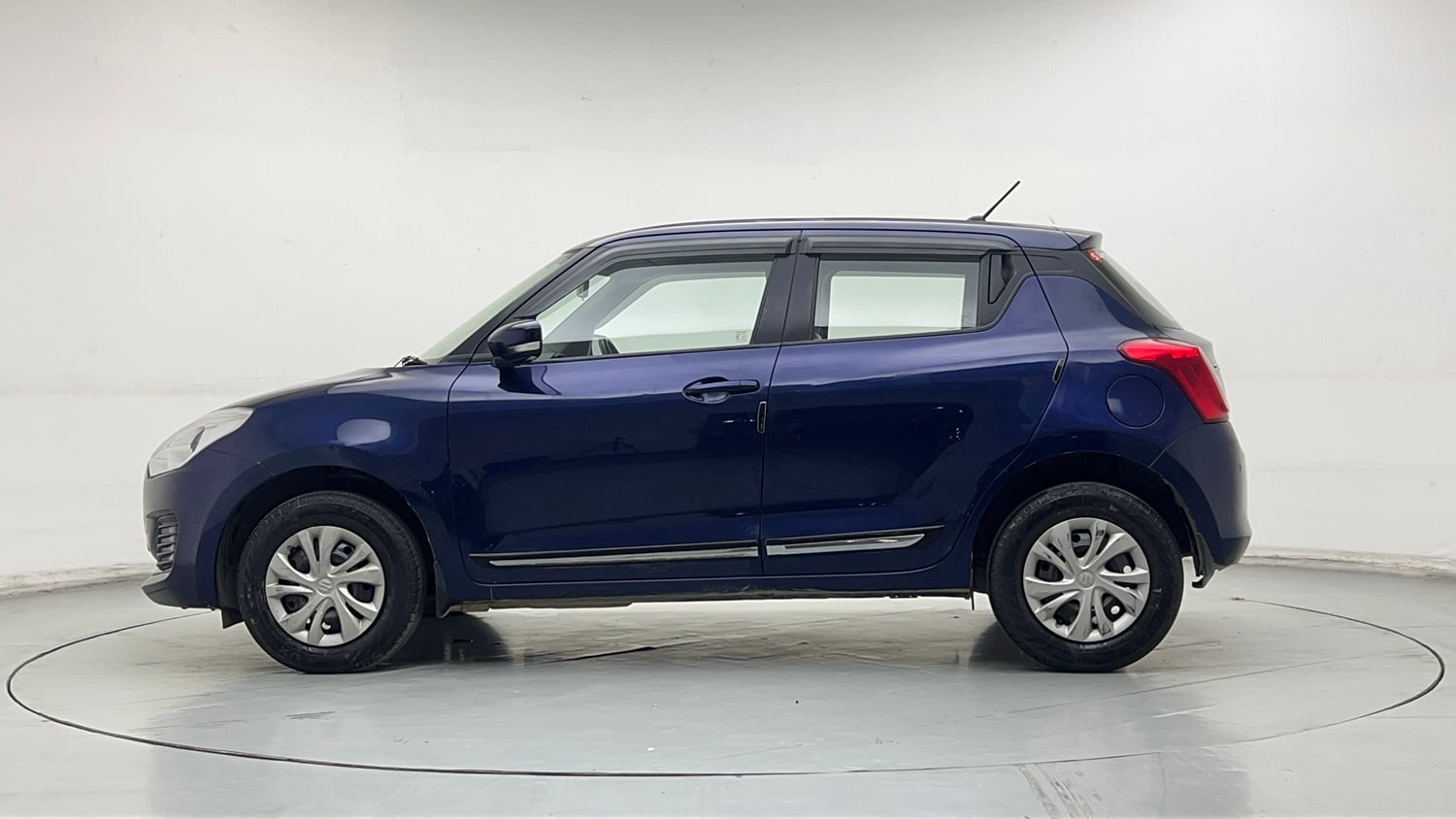 Used 2021 Maruti Suzuki Swift VXi Petrol Manual exterior LEFT SIDE VIEW
