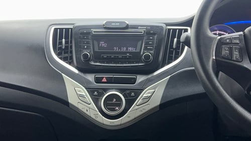 Used 2015 Maruti Suzuki Baleno Delta 1.2 Petrol Manual top_features Integrated (in-dash) music system