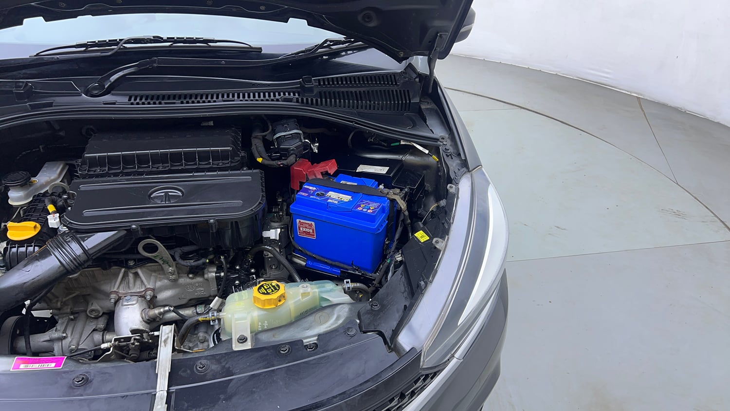 Used 2023 Tata Tigor XZA Plus Leatherette Pack Petrol Automatic engine ENGINE LEFT SIDE VIEW
