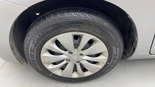 Used 2015 Maruti Suzuki Baleno Delta 1.2 Petrol Manual tyres LEFT FRONT TYRE RIM VIEW