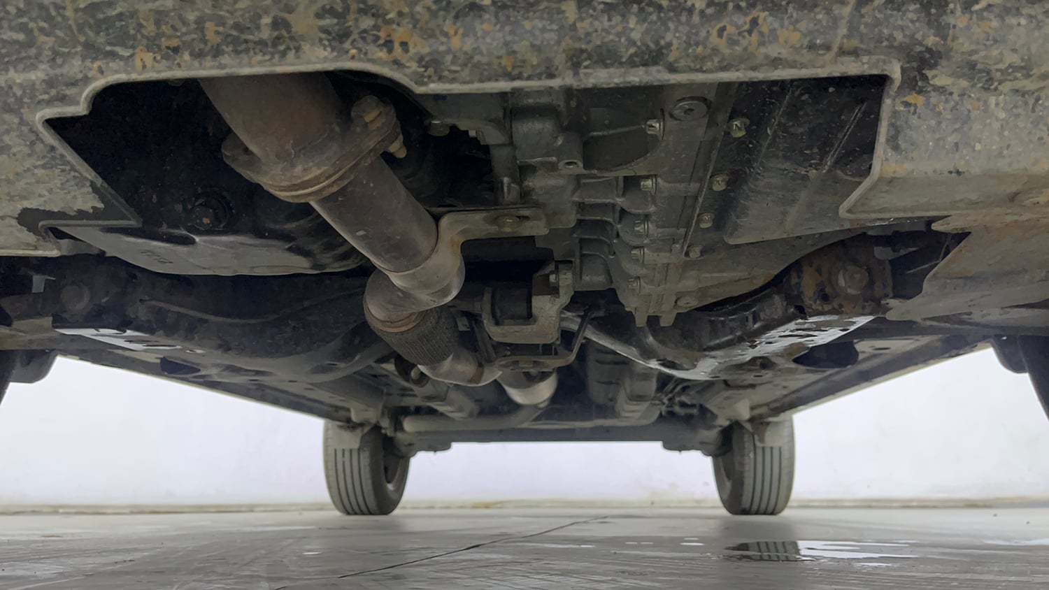 Used 2025 Tata Nexon Creative Plus 1.2 Revotron Petrol 7DCA DT Petrol Automatic extra FRONT LEFT UNDERBODY VIEW