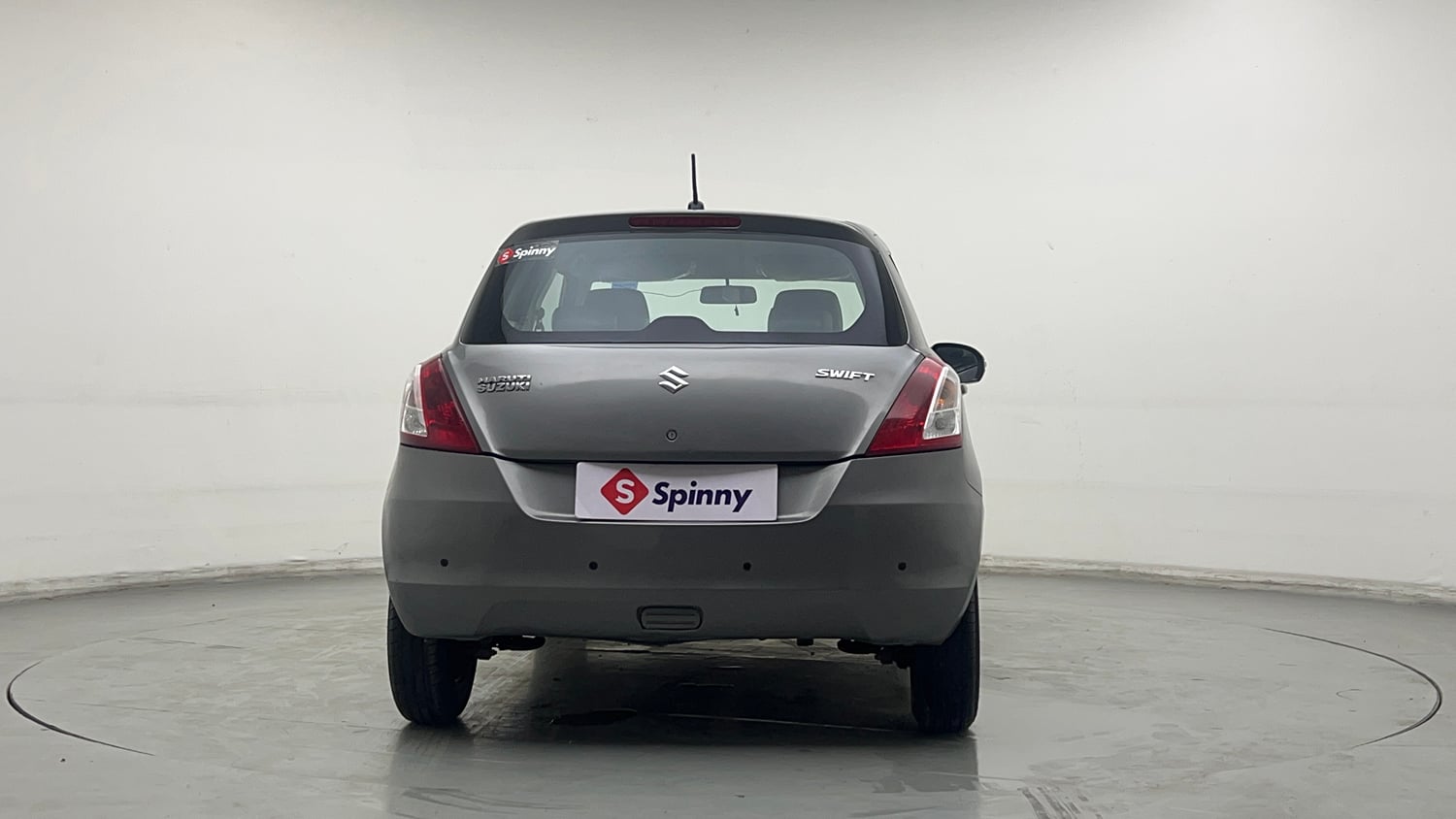 Used 2015 Maruti Suzuki Swift Lxi (O) Petrol Manual exterior BACK VIEW