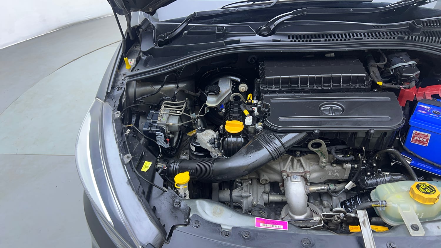 Used 2023 Tata Tigor XZA Plus Leatherette Pack Petrol Automatic engine ENGINE RIGHT SIDE VIEW