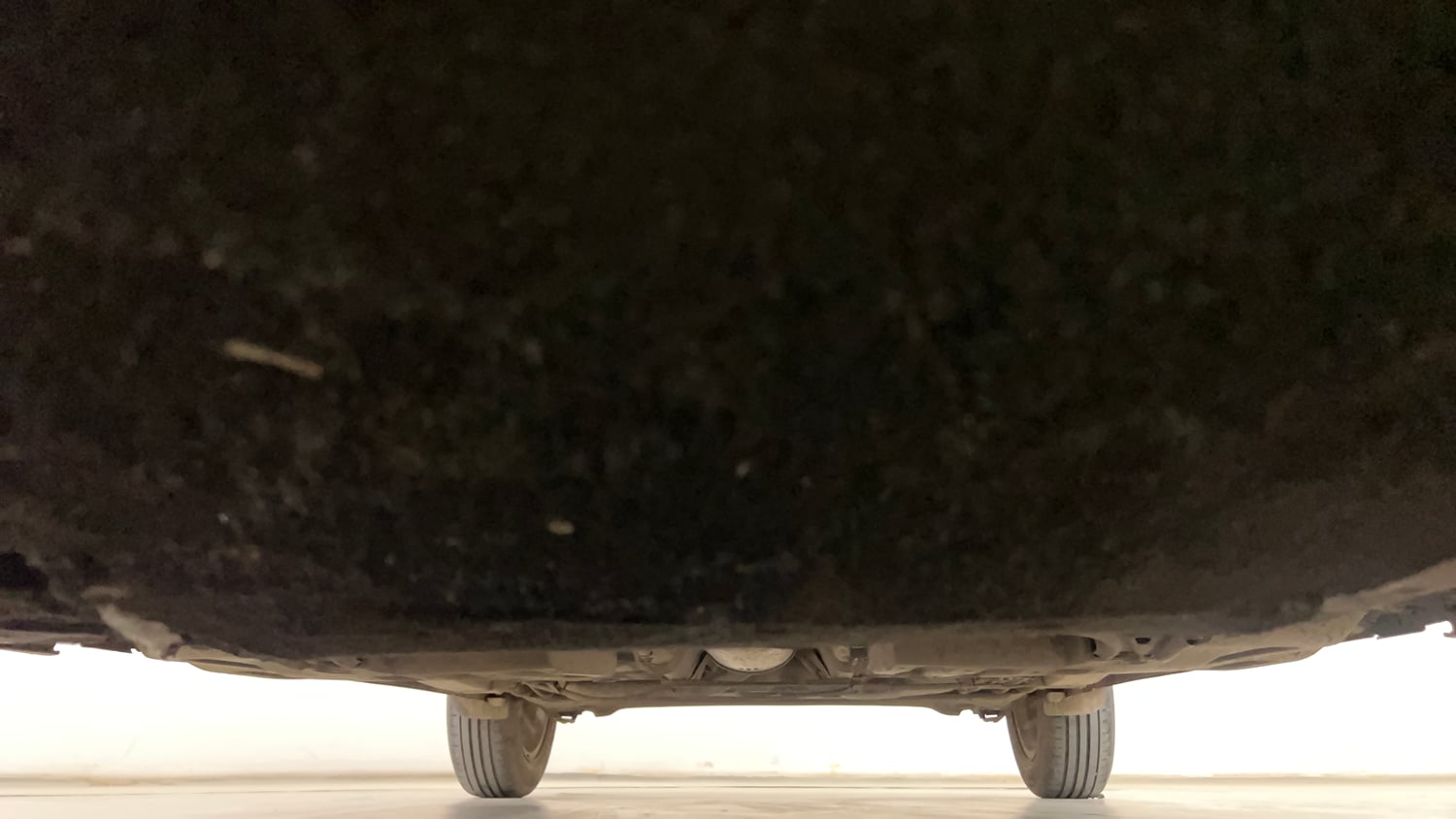 Used 2021 Maruti Suzuki Dzire ZXi AGS Petrol Automatic extra FRONT LEFT UNDERBODY VIEW