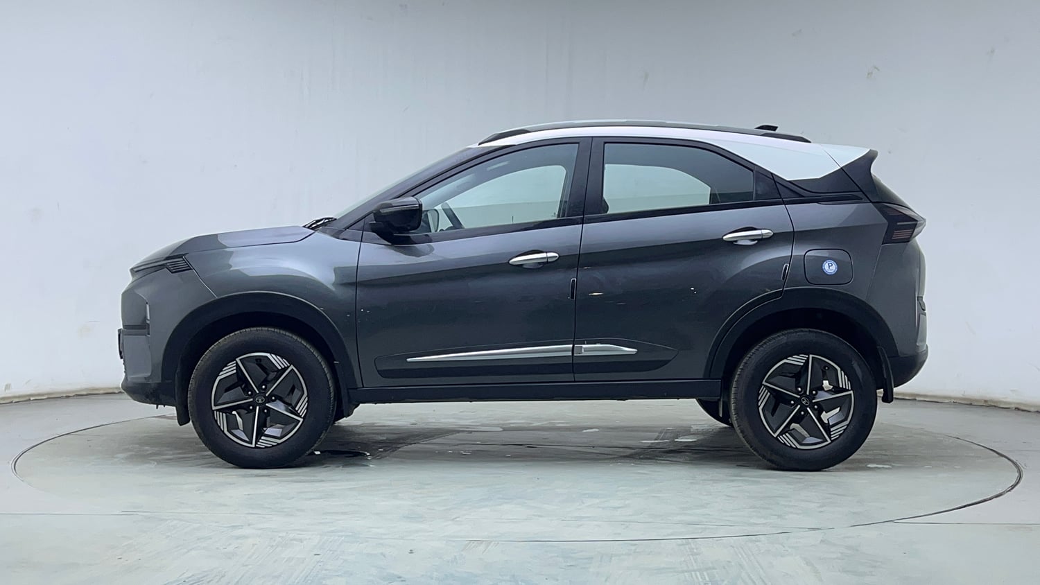 Used 2025 Tata Nexon Creative Plus 1.2 Revotron Petrol 7DCA DT Petrol Automatic exterior LEFT SIDE VIEW