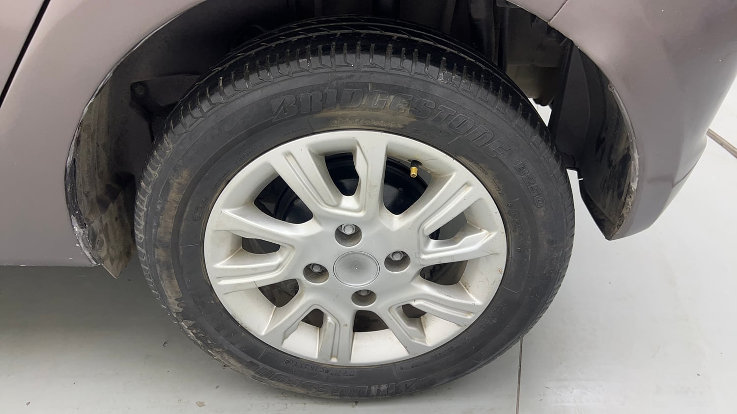 Used 2017 Tata Tiago Revotron XZ Petrol Manual tyres LEFT REAR TYRE RIM VIEW