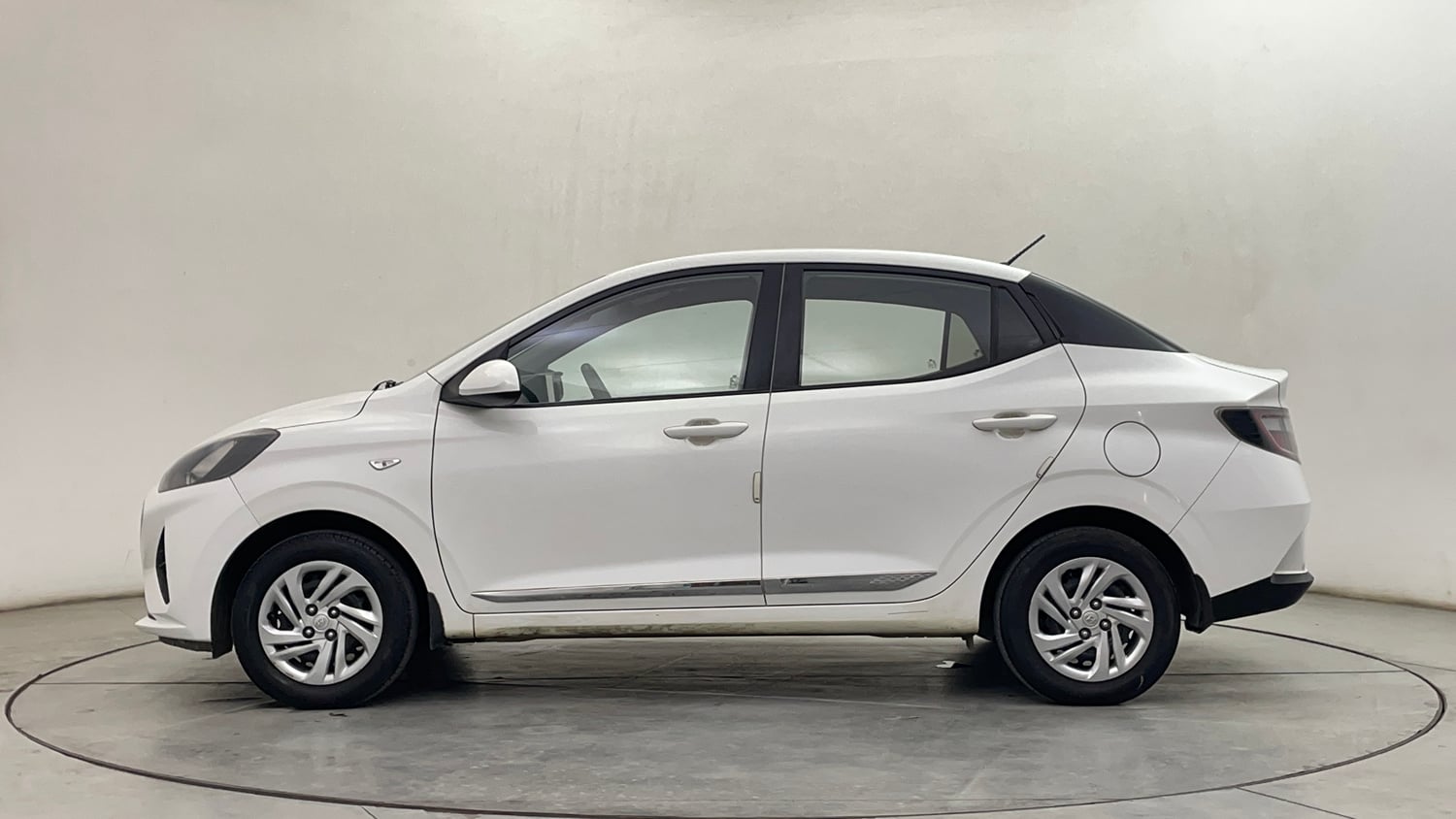 Used 2022 Hyundai Aura S 1.2 CNG Cng Manual exterior LEFT SIDE VIEW