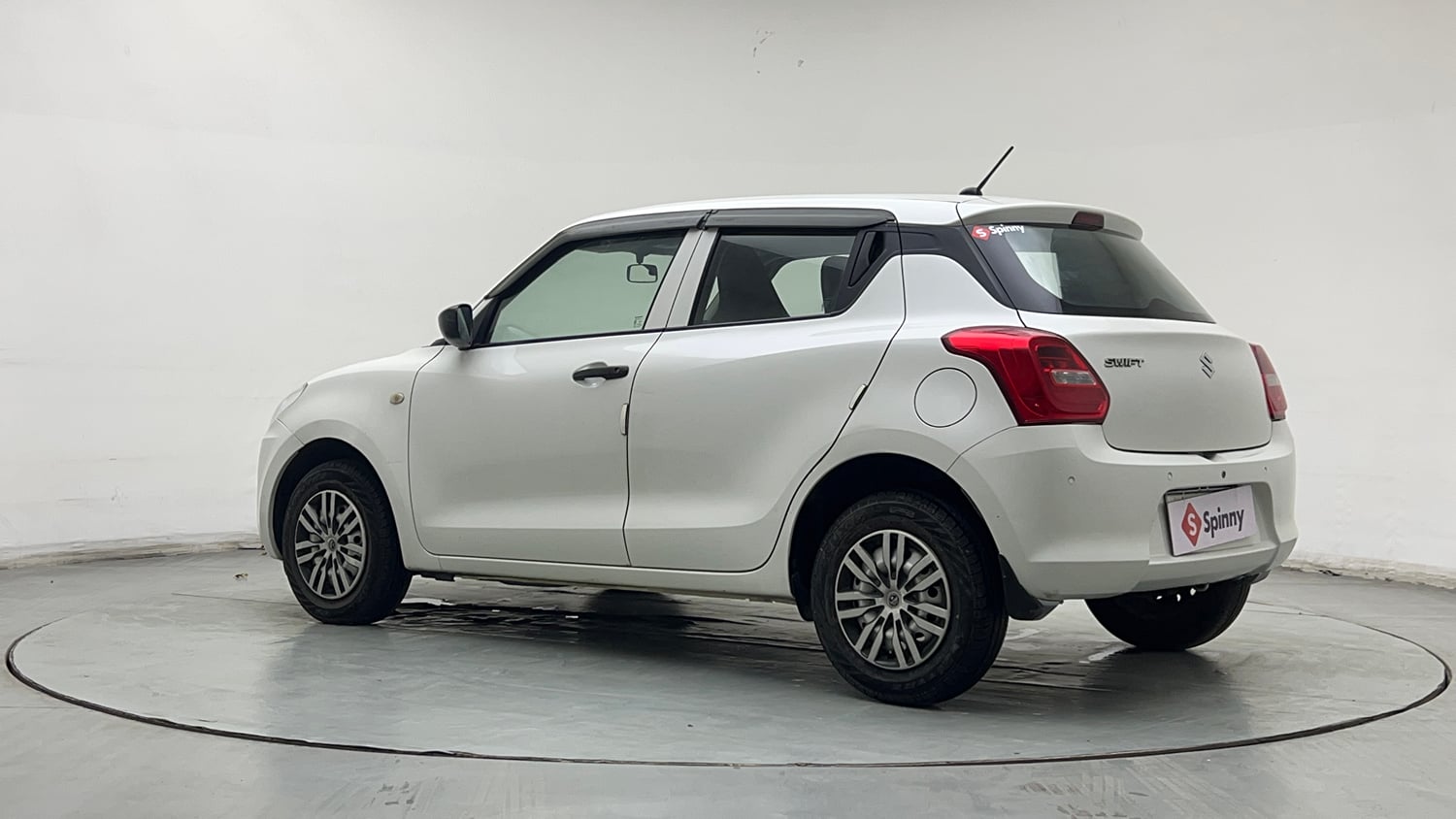 Used 2023 Maruti Suzuki Swift LXi Petrol Manual exterior LEFT REAR CORNER VIEW