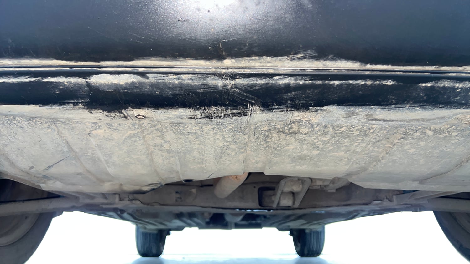 Used 2022 Maruti Suzuki Brezza Vxi AT Petrol Automatic extra FRONT LEFT UNDERBODY VIEW
