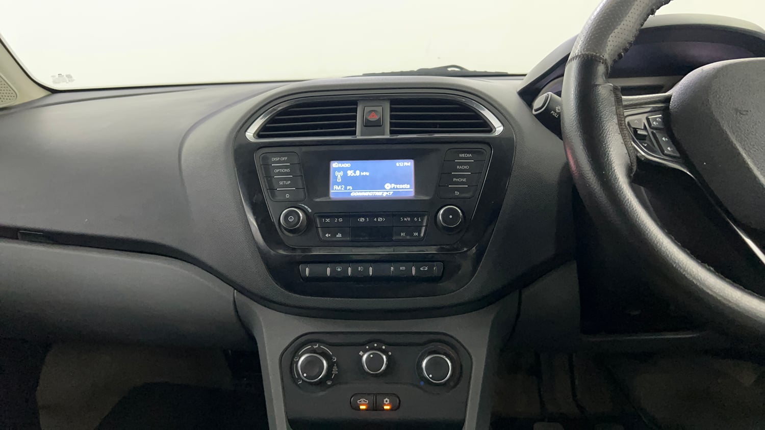 Used 2017 Tata Tigor Revotron XZ Petrol Manual interior MUSIC SYSTEM & AC CONTROL VIEW