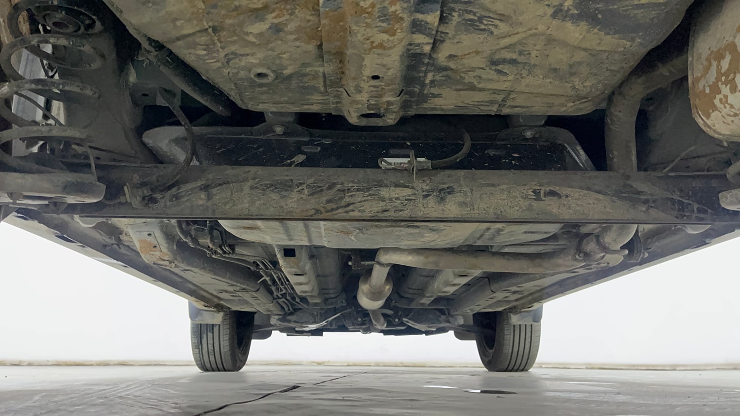 Used 2025 Tata Nexon Creative Plus 1.2 Revotron Petrol 7DCA DT Petrol Automatic extra REAR UNDERBODY VIEW (TAKEN FROM REAR)