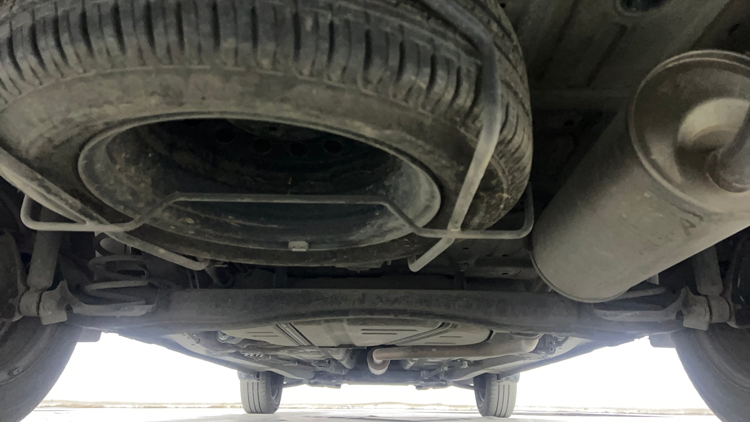 Used 2022 Maruti Suzuki New Ertiga VXi AT Petrol Automatic extra REAR UNDERBODY VIEW (TAKEN FROM REAR)