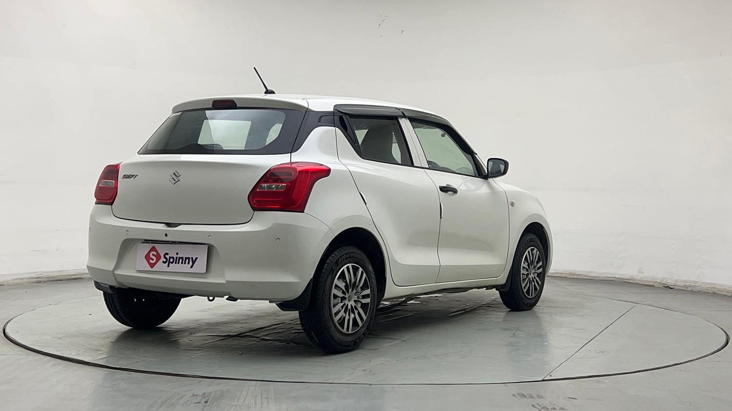 Used 2023 Maruti Suzuki Swift LXi Petrol Manual exterior RIGHT REAR CORNER VIEW