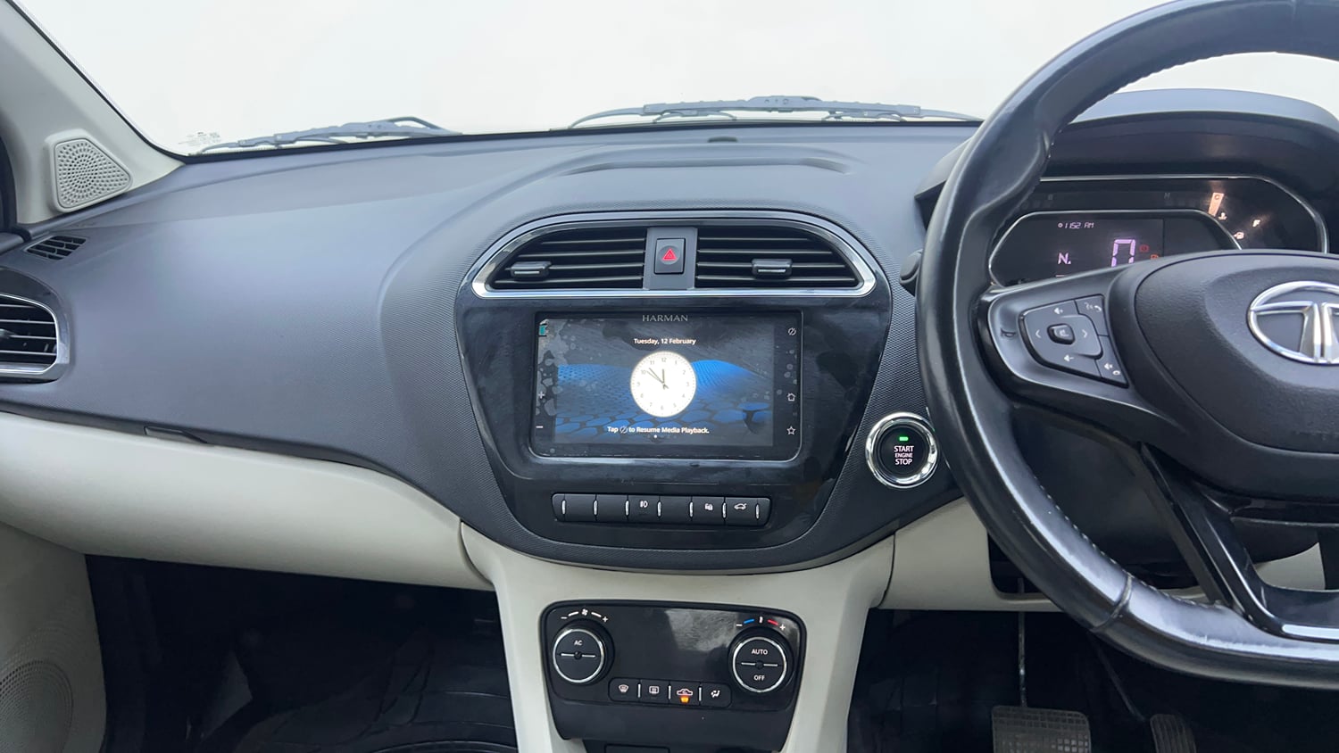 Used 2023 Tata Tigor XZA Plus Leatherette Pack Petrol Automatic interior MUSIC SYSTEM & AC CONTROL VIEW