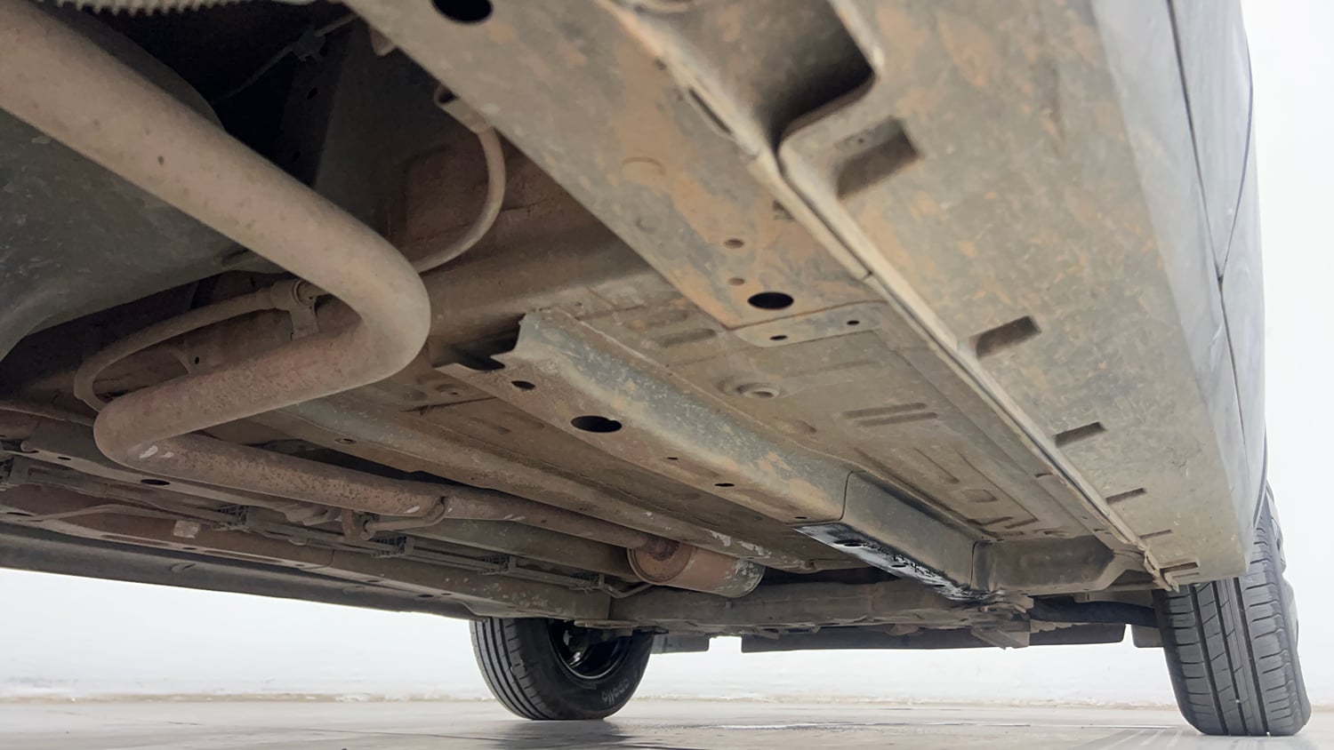 Used 2022 Tata Punch Adventure Rhythm Pack AMT Petrol Automatic extra REAR RIGHT UNDERBODY VIEW