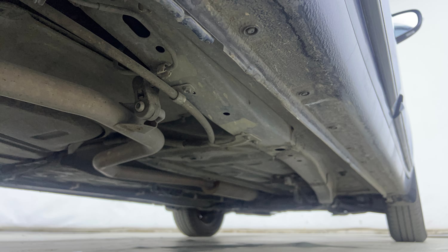Used 2022 Maruti Suzuki New Ertiga VXi AT Petrol Automatic extra REAR RIGHT UNDERBODY VIEW