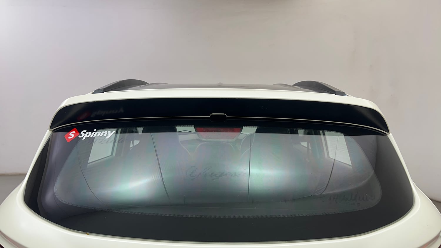 Used 2016 Mahindra KUV100 K4 6 STR Petrol Manual exterior BACK WINDSHIELD VIEW