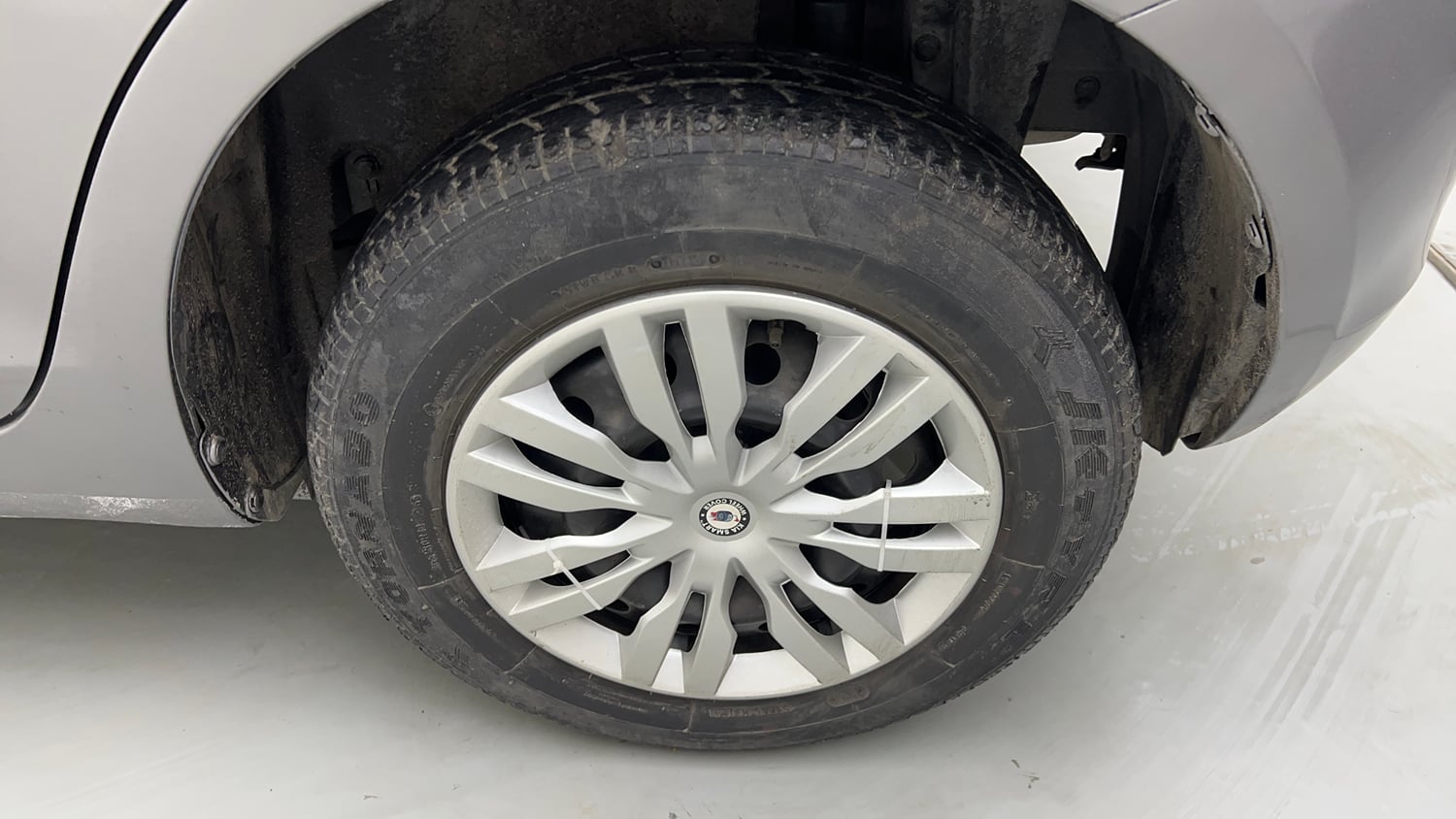 Used 2014 Maruti Suzuki Swift VXi Petrol Manual tyres LEFT REAR TYRE RIM VIEW