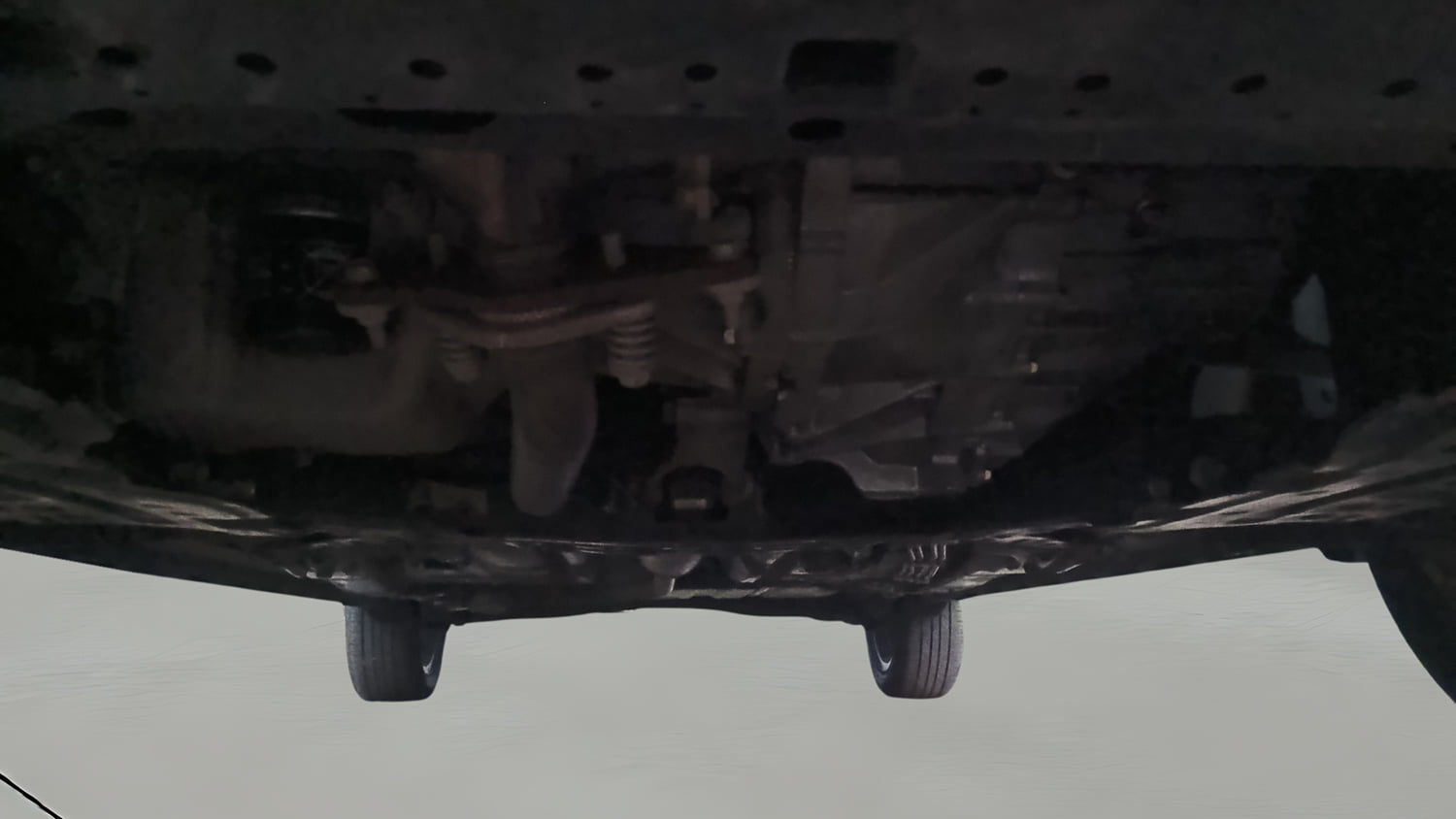 Used 2024 Maruti Suzuki XL6 Zeta MT Petrol Petrol Manual extra FRONT LEFT UNDERBODY VIEW