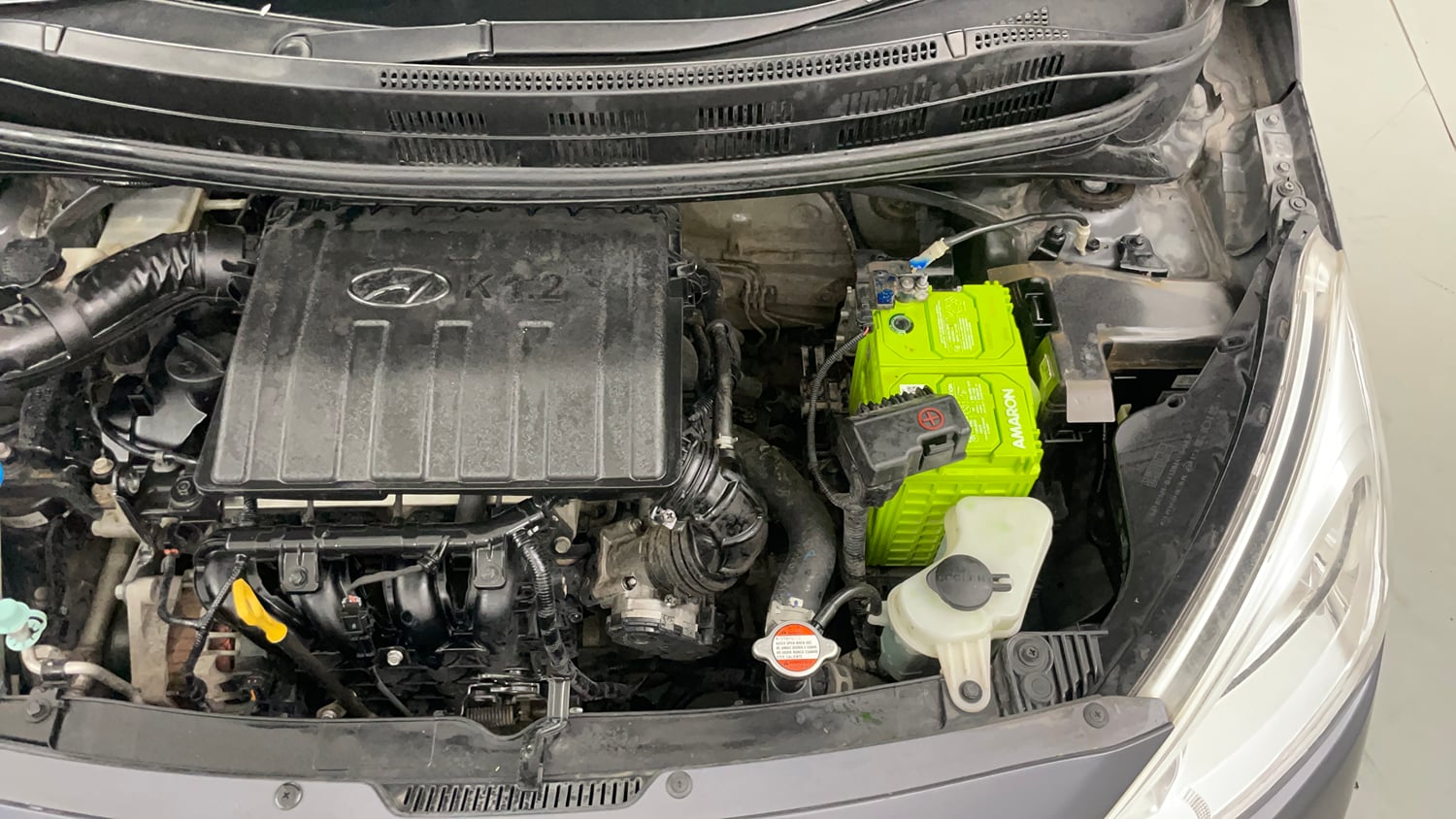 Used 2017 Hyundai Grand i10 Sportz (O) 1.2 Kappa VTVT Petrol Manual engine ENGINE LEFT SIDE VIEW