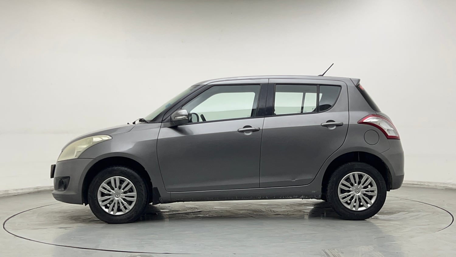 Used 2014 Maruti Suzuki Swift VXi Petrol Manual exterior LEFT SIDE VIEW