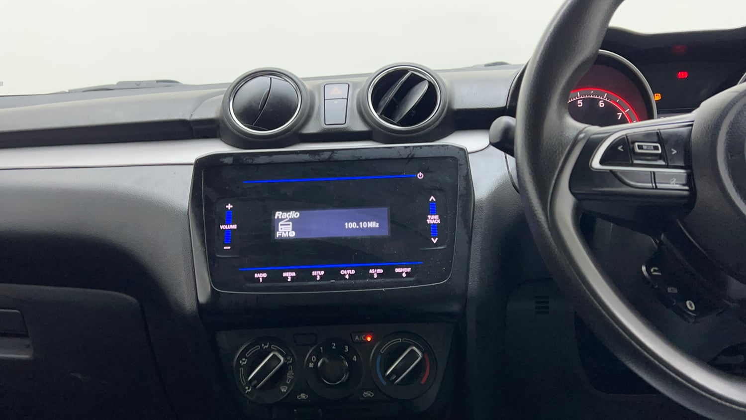 Used 2022 Maruti Suzuki Swift VXi Petrol Manual interior MUSIC SYSTEM & AC CONTROL VIEW