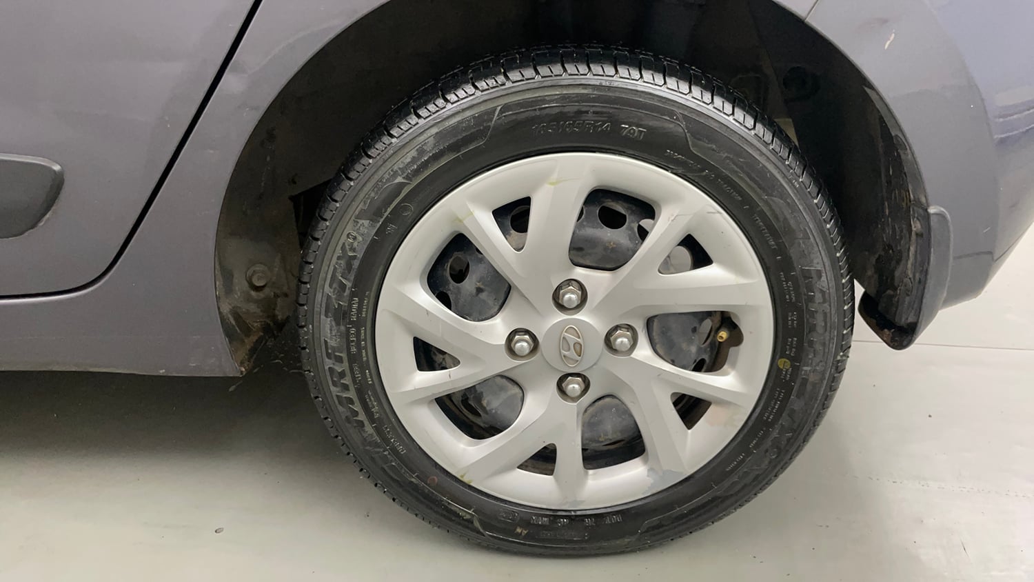 Used 2017 Hyundai Grand i10 Sportz (O) 1.2 Kappa VTVT Petrol Manual tyres LEFT REAR TYRE RIM VIEW