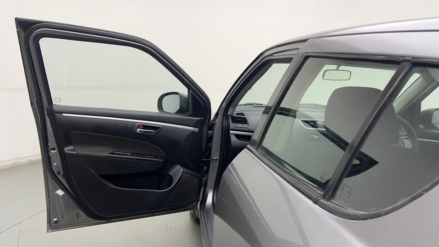 Used 2014 Maruti Suzuki Swift VXi Petrol Manual interior LEFT FRONT DOOR OPEN VIEW